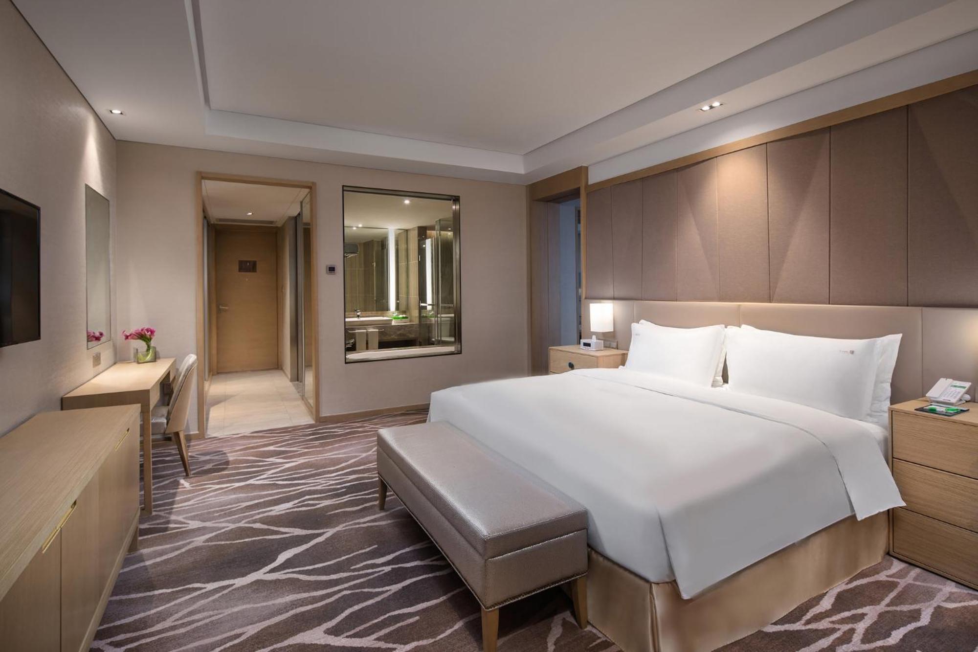 Holiday Inn Wuxi Taihu New City By Ihg Экстерьер фото
