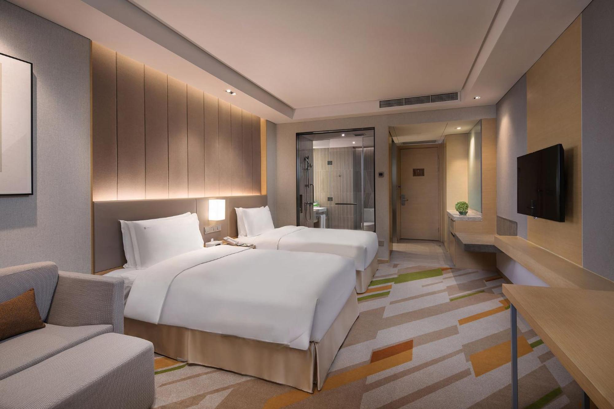 Holiday Inn Wuxi Taihu New City By Ihg Экстерьер фото