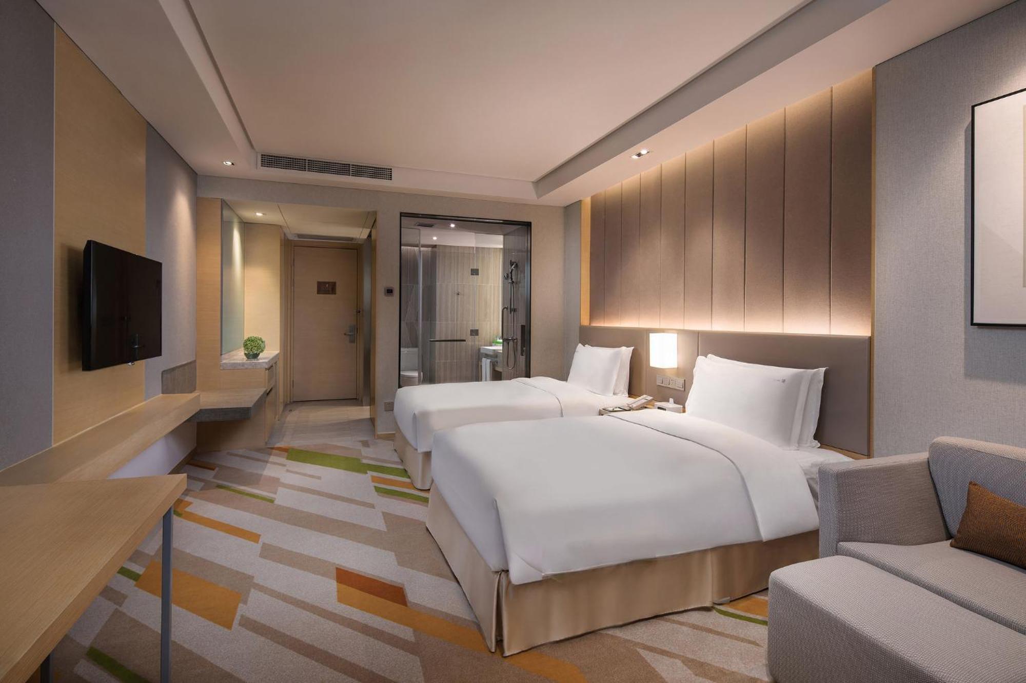 Holiday Inn Wuxi Taihu New City By Ihg Экстерьер фото